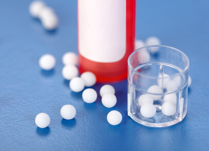 homeopathic-pills-and-plastic-containers_size