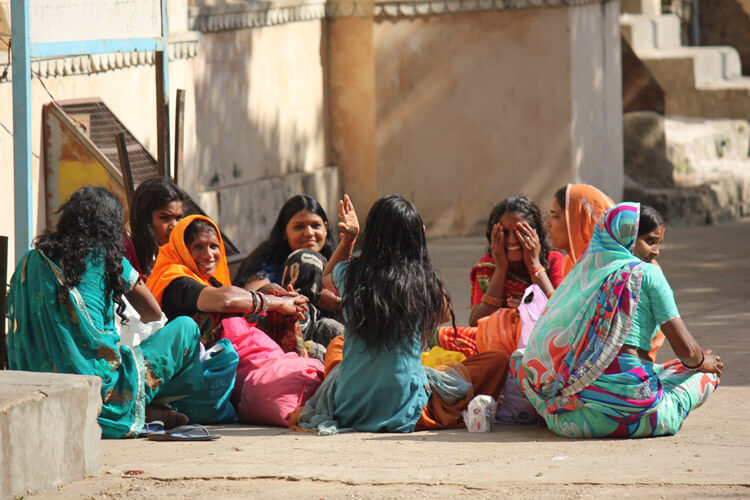 Accredited Social Health Activists talking to Indian Village women